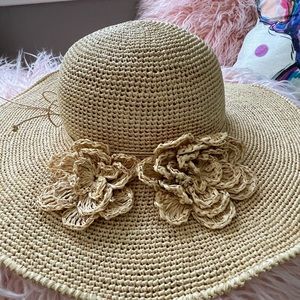 Helen Kaminski wire rim raffia hat with floral accent
